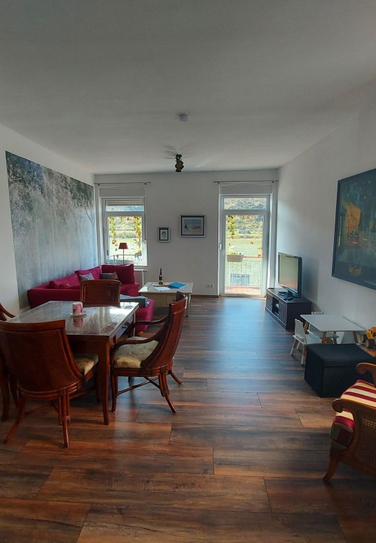 Sterrenberg Wohn- und Esszimmer mit Holzofen | &copy; Heimes